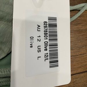 Indikah by Angel Biba Oliver green dress with a tie